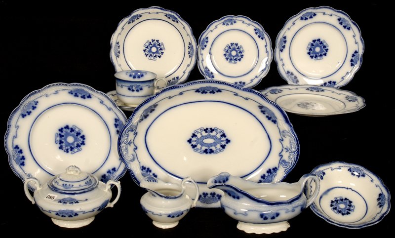 (12) FLOW BLUE LORNE PATTERN ITEMS BY GRINDLEY: INCLUDES - (1) 14" TRAY - (1) 10" PLATE - (1) 8 3/4" PLATE - (1) 7 3/4" PLATE - (1) 6 3/4" PLATE - (1) 7 1/2" BOWL - (1) 6 1/2" BOWL - (1) GRAVY BOAT - (1) CREAMER - (1) SUGAR - CUP AND SAUCER - POSSI