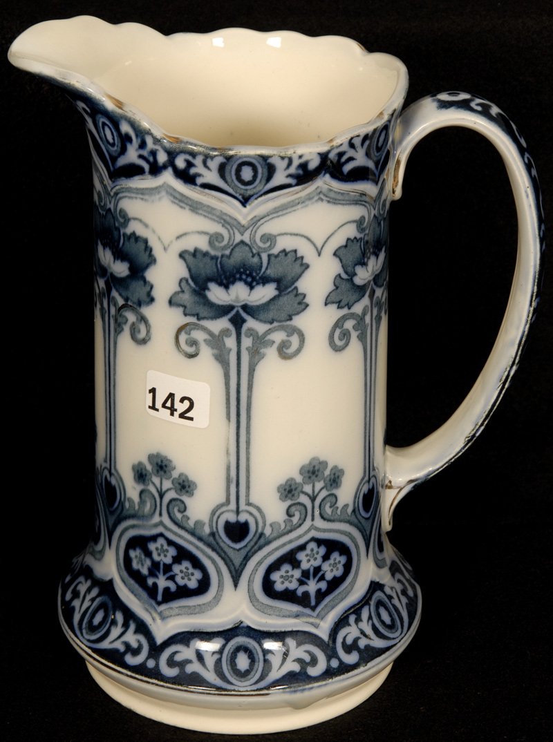 8 1/2" FLOW BLUE TANKARD IN VICTORIA PATTERN