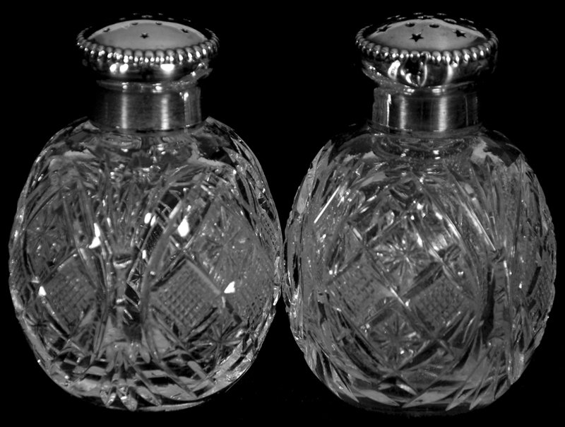 PAIR 2 3/4" AMERICAN BRILLIANT CUT GLASS SALT & PEPPER: PAIR 2 3/4" AMERICAN BRILLIANT CUT GLASS SALT & PEPPER SHAKERS STRAWBERRY DIAMOND, STAR AND FAN MOTIF - STERLING LIDS