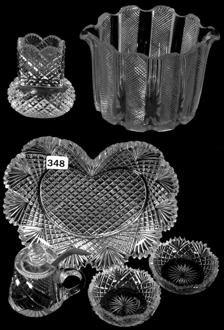 (6) MISCELLANEOUS AMERICAN BRILLIANT CUT GLASS ITEMS: (6) MISCELLANEOUS AMERICAN BRILLIANT CUT GLASS ITEMS (1) 7" HEART SHAPED CROSSCUT DIAMOND AND FAN PLATE (CHIPPED) - (1) 3" TOOTHPICK HOLDER - (2) 3" SALT DIPS - (1) MUSTARD JAR - (1) 3 1/2" WINE POURE