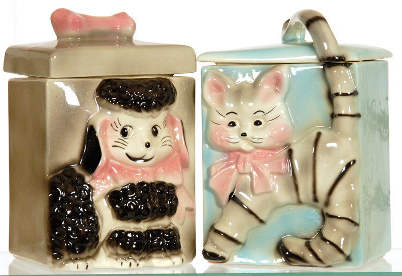 (2) 10" UNMARKED SQUARE COOKIE EMBOSSED COOKIE JARS: (2) 10" UNMARKED SQUARE COOKIE EMBOSSED COOKIE JARS (1) BLUE WITH CAT & TAIL HANDLE - (1) GRAY WITH POODLE & BONE HANDLE