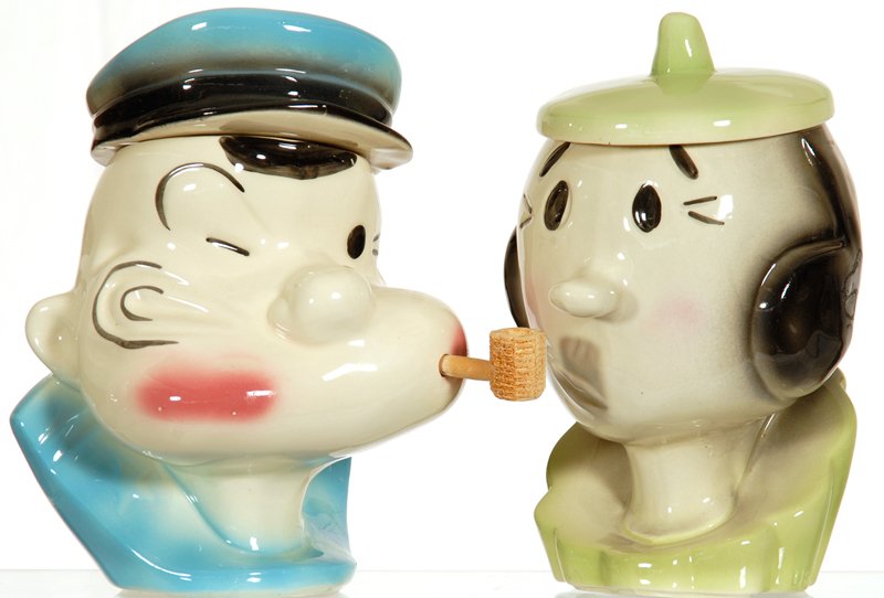 (2) FIGURAL COOKIE JARS: (2) FIGURAL COOKIE JARS 10 1/2" POPEYE - 10 1/2" OLIVE OYL (SLIGHT FACTORY HAIRLINE & INTERIOR RIM CHIP)