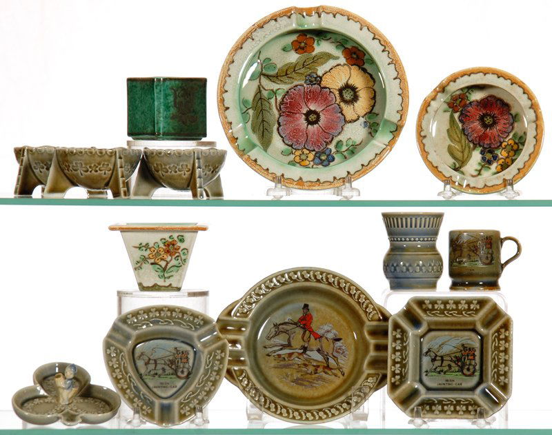 BOXED LOT - (12) ASSORTED ITEMS: BOXED LOT - (12) ASSORTED ITEMS (9) IRISH PORCELAIN FEATURING ASH TRAYS, TOOTHPICK HOLDER AND MORE - (3) GOUDA POTTERY ITEMS