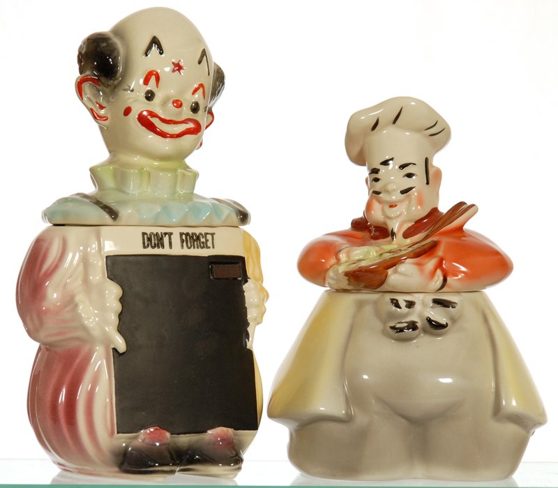 (2) FIGURAL COOKIE JARS: (2) FIGURAL COOKIE JARS 13" CLOWN WITH CHALK BOARD FRONT - 11" CHEF WITH SLIGHT INTERIOR RIM CHIPPING
