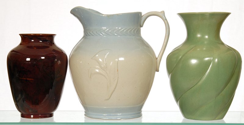 (3) ANTIQUE POTTERY & STONEWARE ITEMS: (3) ANTIQUE POTTERY & STONEWARE ITEMS (1) 10" BLUE AND WHITE STONEWARE WASH PITCHER WITH EMBOSSED TULIP DECOR, ATTRIBUTED TO RED WING - (1) 10" RED WING GREEN ART POTTERY VASE - (1) 8" DECORO ENGLISH 