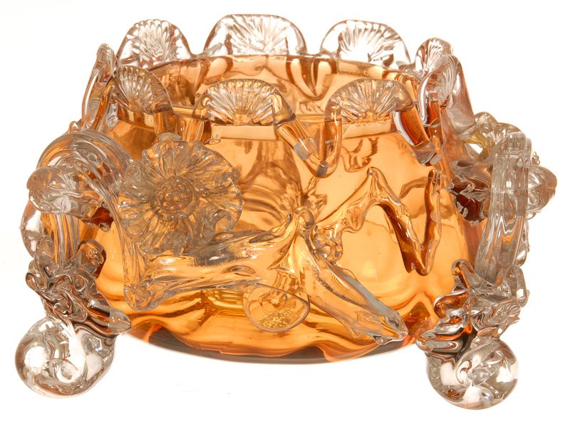 5" X 7" STEVENS AND WILLIAMS FOOTED BOWL: 5" X 7" STEVENS AND WILLIAMS FOOTED BOWL AMBER BODY WITH EXTENSIVE CLEAR APPLIED GLASS BRANCH, BLOSSOM AND PETAL DESIGN - ONE BLOSSOM WITH SERIOUS REPAIR