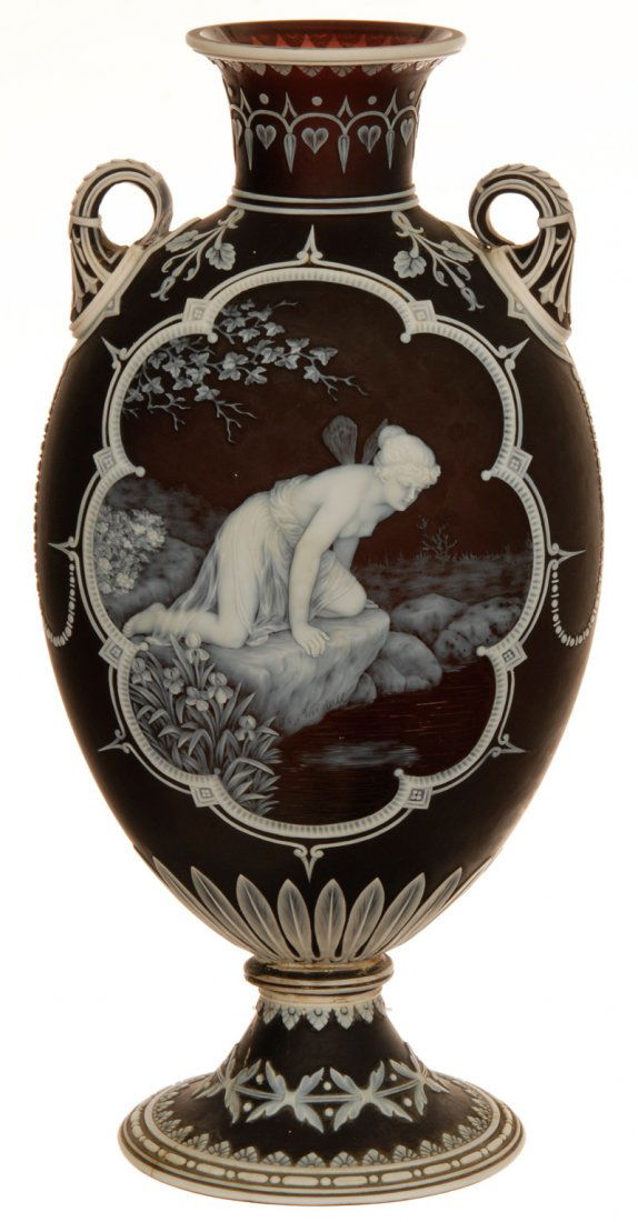 11" SIGNED "THOMAS WEBB & SONS GEM CAMEO" ENGLISH CAMEO: 11" SIGNED "THOMAS WEBB & SONS GEM CAMEO" ENGLISH CAMEO PEDESTAL HANDLED VASE BEAUTIFUL RAISIN BACKGROUND WITH EXTENSIVE WHITE OPAL CARVED OVERLAY FEATURING NYMPH LOOKING INTO REFLECTING POOL - TITLED