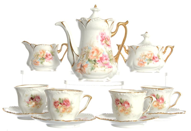 RARE 11 PIECE UNMARKED PRUSSIA CHILDS TEA SET: RARE 11 PIECE UNMARKED PRUSSIA CHILDS TEA SET WHITE W/ ROSE DECOR AND GOLD TRIM HIGHLIGHTS - INCLUDES: 3 1/2" TEA POT WITH MATCHING CREAMER, SUGAR, (4) CUPS AND (4) SAUCERS - NICE SET!