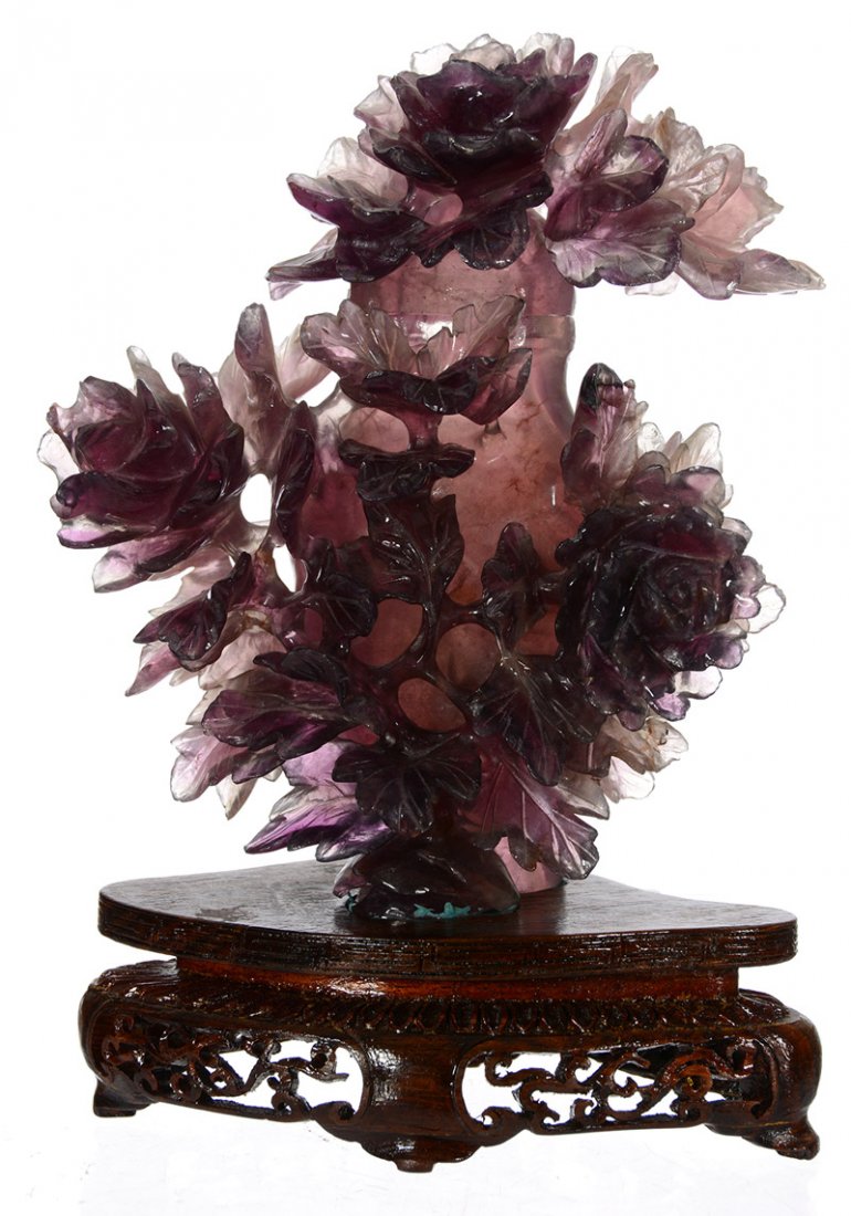 6" LAVENDER AND WHITE QUARTZ CARVED ORIENTAL COVERED: 6" LAVENDER AND WHITE QUARTZ CARVED ORIENTAL COVERED JAR EXTENSIVE ROSE BLOSSOM DECOR WITH PATTERN CUT LID - SET ON TEAKWOOD BASE - FEW MINOR CHIPS ON SOME LEAVES