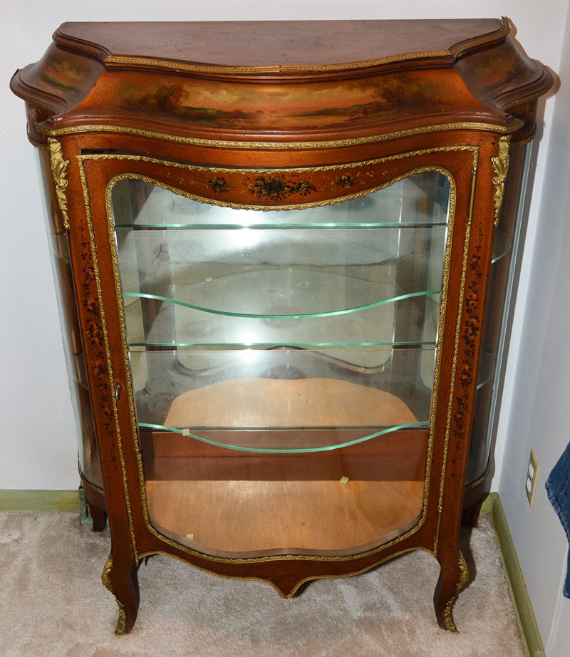 48" X 39" X 17" FRENCH S FRONT LIGHTED DISPLAY CABINET: 48" X 39" X 17" FRENCH S FRONT LIGHTED DISPLAY CABINET GOLD BACKGROUND WITH HANDPAINTED FLORAL AND LAKE SCENIC DECOR - GILT METAL FITTINGS - MIRROR BACK - TWO GLASS SHELVES - SOME FITTINGS LOSE OR MIS