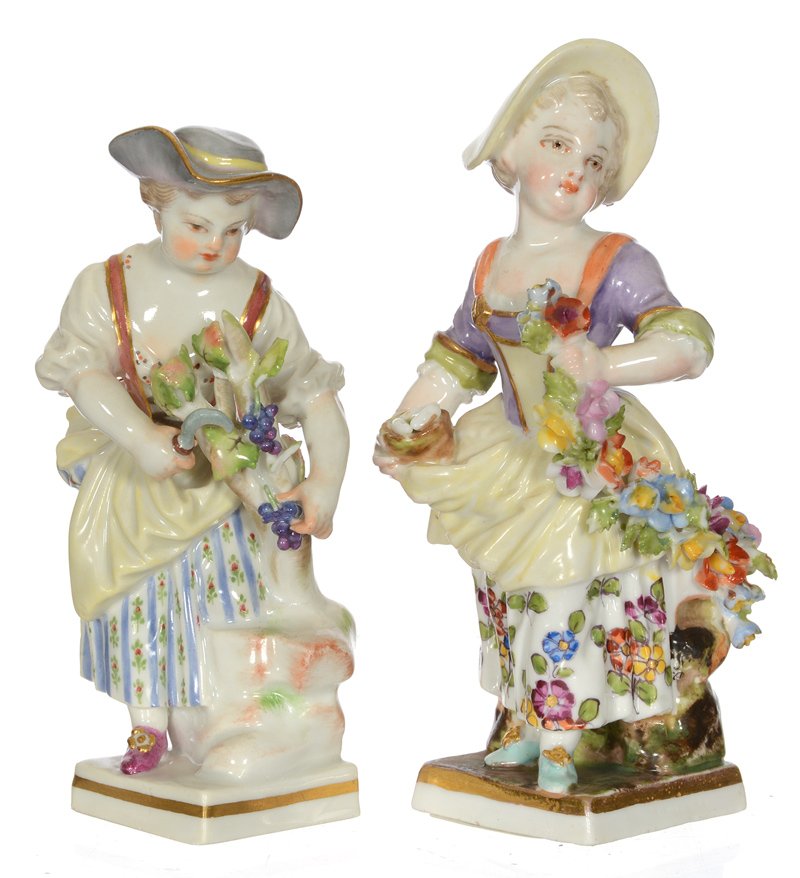 (2) 4 1/2" MEISSEN STYLE FIGURINES: (2) 4 1/2" MEISSEN STYLE FIGURINES (1) BLUE CROSSED SWORDS MARK FEATURING GIRL HARVESTING GRAPES - (1) BLUE "AR" MARK WITH GIRL HOLDING FLORAL GARLAND