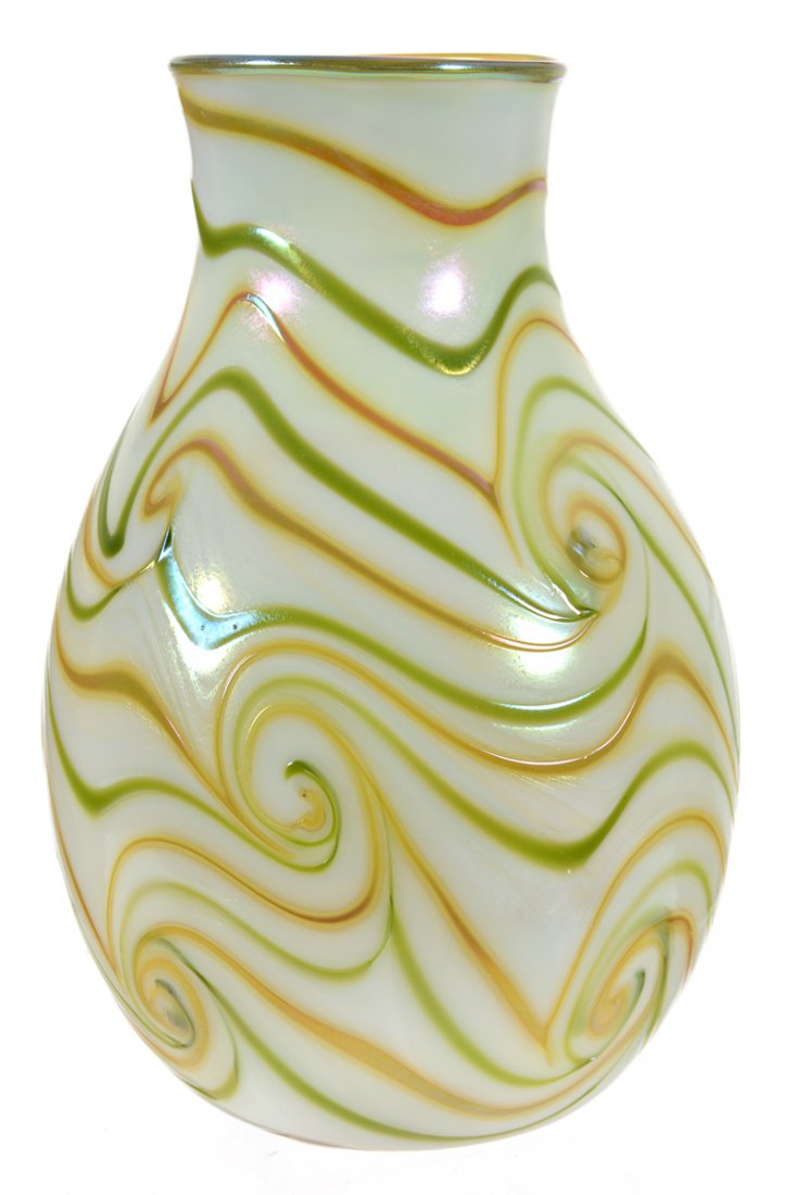 8 3/4" SIGNED CHARLES LOTTON ART GLASS VASE: 8 3/4" SIGNED CHARLES LOTTON ART GLASS VASE - WHITE BACKGROUND W/ GREEN & CARMEL COLORED PULLED SWIRL DESIGN - GREEN IRIDESCENT INTERIOR - DATED 1977