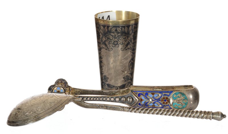 (3) RUSSIAN ITEMS: (3) RUSSIAN ITEMS (1) 2 7/8" .875 SILVER SHOT GLASS WITH BLACK 'SILHOUETTE' FLORAL DECOR, INSCRIPTION DATED 1870 - (1) 5 1/2" RUSSIAN ENAMEL AND SILVER TONGS - (1) 7 1/2" RUSSIAN SILVER SPOON WITH TWI