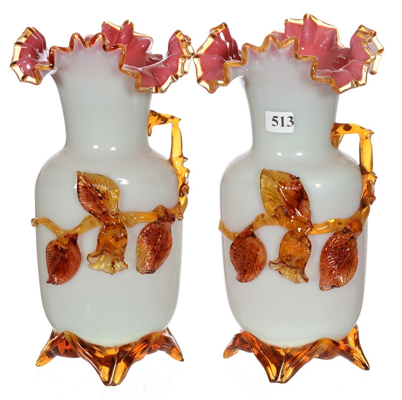 PAIR 10 1/2" STEVENS AND WILLIAMS FOOTED ART GLASS: PAIR 10 1/2" STEVENS AND WILLIAMS FOOTED ART GLASS PINK INTERIOR - WHITE EXTERIOR - APPLIED AMBER LEAF AND BLOSSOM DECOR - SOME CHIPPING ON FEET