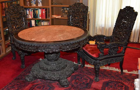 31" X 49" ROUND ORIENTAL CARVED LIBRARY TABLE WITH (3): 31" X 49" ROUND ORIENTAL CARVED LIBRARY TABLE WITH (3) INTRICATE SCROLL WORK WITH FOO DOG AND DRAGON HIGHLIGHTS - THIS SET IS NEARLY TWICE AS HEAVY AS WOULD BE EXPECTED - ESTIMATED WEIGHT OF OVER 350