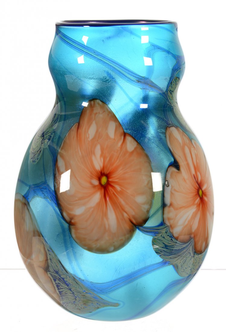 7 1/2" SIGNED CHARLES LOTTON GLASS "MULTI FLORA" VASE: 7 1/2" SIGNED CHARLES LOTTON ART GLASS "MULTI FLORA" VASE - ICE BLUE BACKGROUND W/ WHITE & ORANGE BLOSSOM, GREEN & BLUE VINE DECOR - DATED 1977