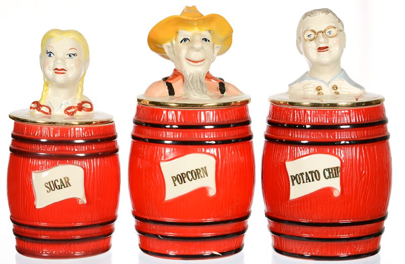 BOX LOT: BOX LOT (3) PIECE CANISTER SET INCLUDES: (2) 11" AND (1) 10" - RED BARREL BODY FOR POPCORN, POTATO CHIPS AND SUGAR - MAN, WOMAN AND GIRL - BASE OF POPCORN HAS SERIOUS CRACK