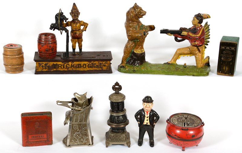 BOX LOT: BOX LOT (9) VINTAGE BANKS INCLUDING: (1) 7 1/2" X 10" INDIAN SHOOTING BEAR MECHANICAL - (1) 7 1/2" X 8 1/2" TRICK DOG MECHANICAL - (1) 6" PIG IN HIGH CHAIR MECHANICAL - (1) TEA KETTLE NICKEL REGISTER 