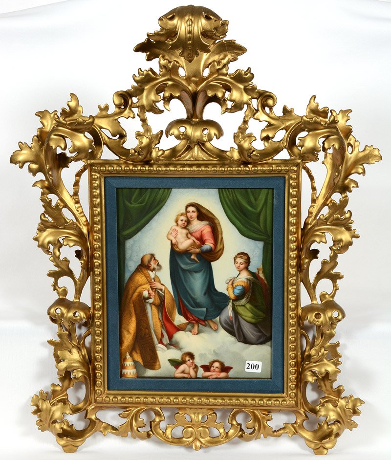 11" X 9" MARKED "KPM" PORCELAIN PLAQUE: 11" X 9" MARKED "KPM" PORCELAIN PLAQUE SCENE OF MARY HOLDING CHRIST CHILD IN CLOUDS - NO ARTIST SIGNATURE VISIBLE - NICE QUALITY - SET IN ELABORATE 23" X 18" GILT WOODEN FRAME