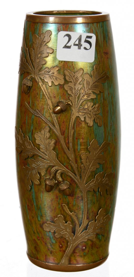 6" UNMARKED LOETZ STYLE ART GLASS VASE: 6" UNMARKED LOETZ STYLE ART GLASS VASE GREEN IRIDESCENCE WITH CARMEL SLAG HIGHLIGHTS - METAL OVERLAY FEATURING DECOR OF BRANCH WITH ACORNS