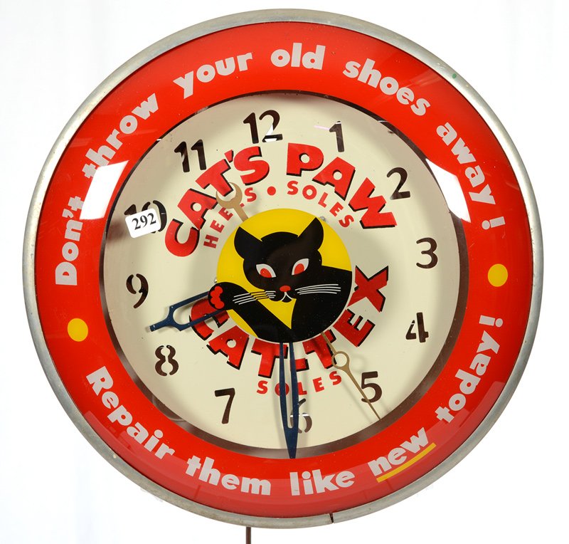 15" VINTAGE ADVERTISING "CATS PAW" ELECTRIC CLOCK: 15" VINTAGE ADVERTISING "CATS PAW" ELECTRIC CLOCK NICE CONDITION - WORKING CONDITION