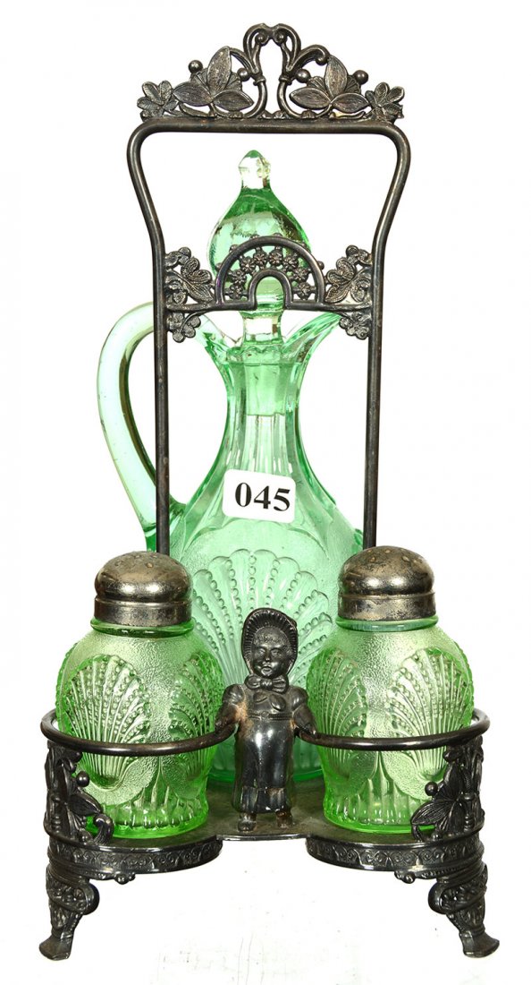 10 1/2" THREE PIECE CONDIMENT SET: 10 1/2" THREE PIECE CONDIMENT SET GREEN PATTERN GLASS BEADED SHELL CRUET BOTTLE WITH SALT & PEPPER SHAKERS - SET ON ROCKFORD SILVERPLATE FRAME WITH FIGURAL KATE GREENAWAY GIRL