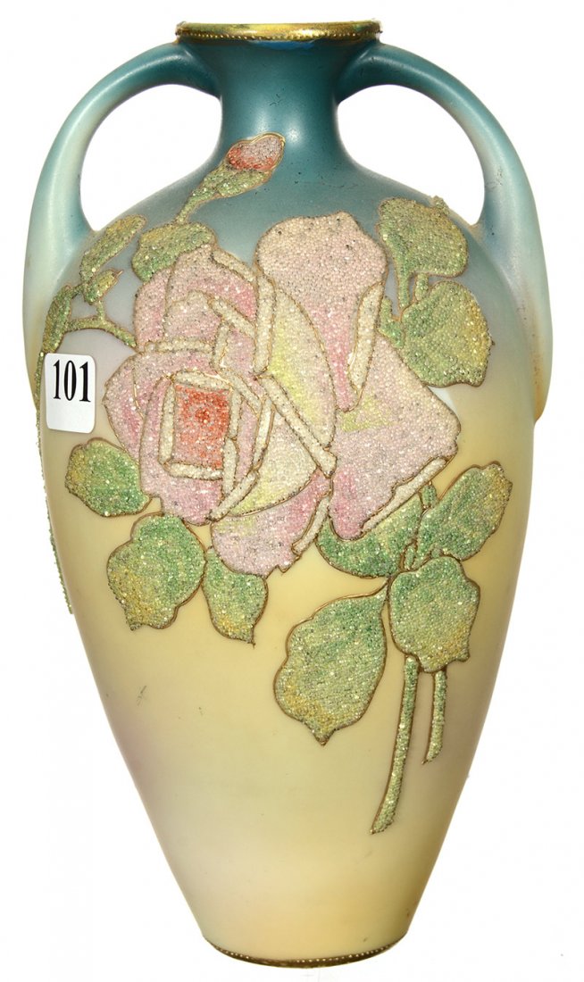 8" NIPPON STYLE TWO HANDLED VASE: 8" NIPPON STYLE TWO HANDLED VASE MARKED WITH CHINESE CHARACTERS - BLUE AND CREAM TONES WITH HEAVY CORALENE DECOR