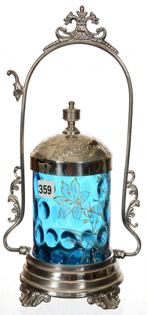 10 3/4" PICKLE CASTOR: 10 3/4" PICKLE CASTOR BLUE COINSPOT ART GLASS INSERT WITH ENAMEL FLORAL DECOR - SET ON WARREN SILVERPLATE FRAME