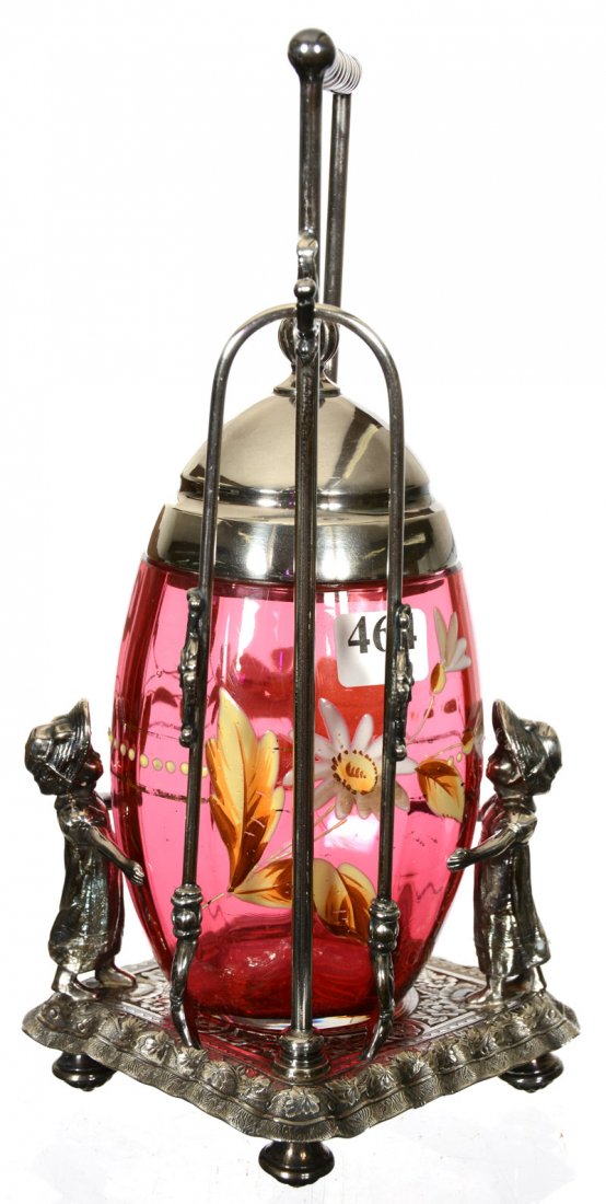 9 1/2" PICKLE CASTOR: 9 1/2" PICKLE CASTOR CRANBERRY ART GLASS EGG SHAPED INSERT WITH ENAMEL FLORAL DECOR - SET ON TUFTS FIGURAL KATE GREENAWAY SILVERPLATE FRAME FEATURING TWO GIRLS HOLDING INSERT