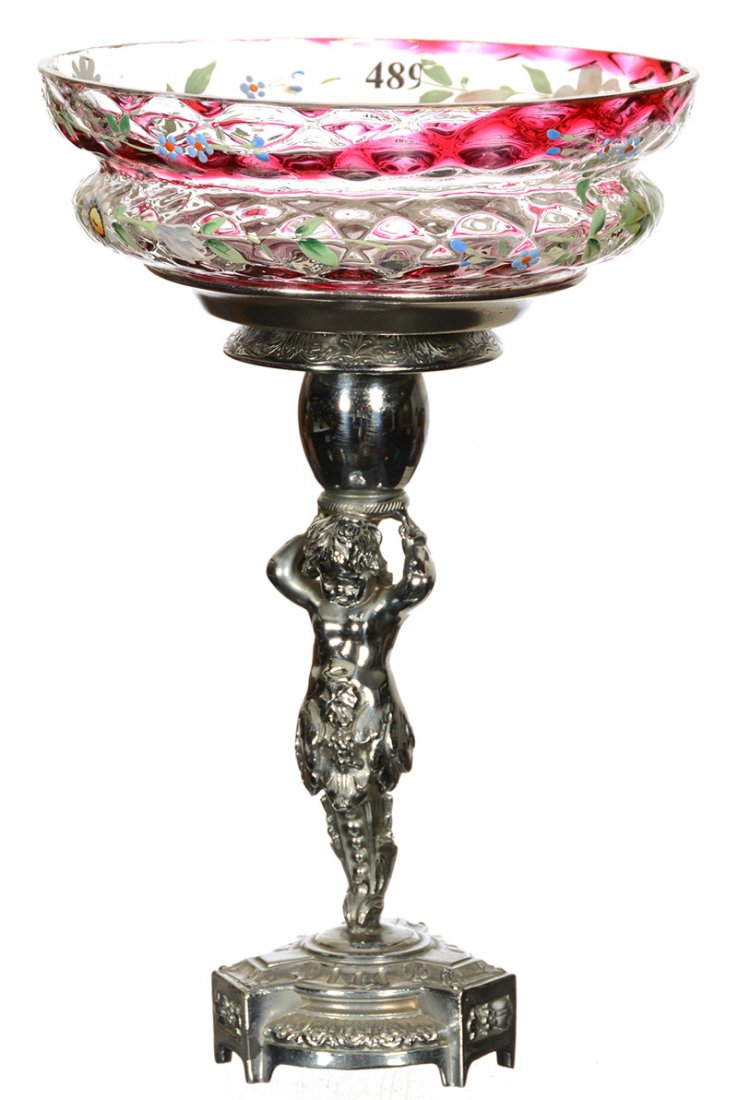 10 1/2" X 7" BRIDES BASKET: 10 1/2" X 7" BRIDES BASKET CLEAR AND CRANBERRY SWIRL CUT VELVET ART GLASS BOWL WITH ENAMEL FLORAL DECOR - SET ON FIGURAL SILVERPLATE STAND FEATURING CHERUB HOLDING BOWL