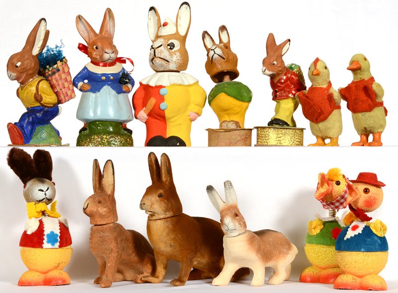 (12) VINTAGE FIGURAL EASTER CANDY CONTAINERS: (12) VINTAGE FIGURAL EASTER CANDY CONTAINERS VARIOUS MATERIALS, SHAPES AND DESIGNS - ONE CONTAINER WITH HEAD REMOVED - OTHER SHOW NORMAL EXPECTED WEAR