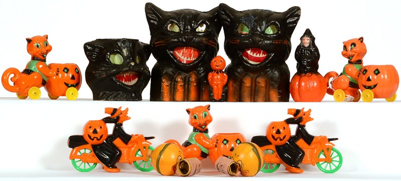 (12) VINTAGE HALLOWEEN ITEMS: (12) VINTAGE HALLOWEEN ITEMS INCLUDES (2) GERMANY NOISEMAKER TOYS - (5) FIGURAL PLASTIC TOYS - (1) CELLULOID PUMPKIN MAN - (3) BLACK CAT AMERICAN PULP LANTERNS - NORMAL EXPECTED WEAR