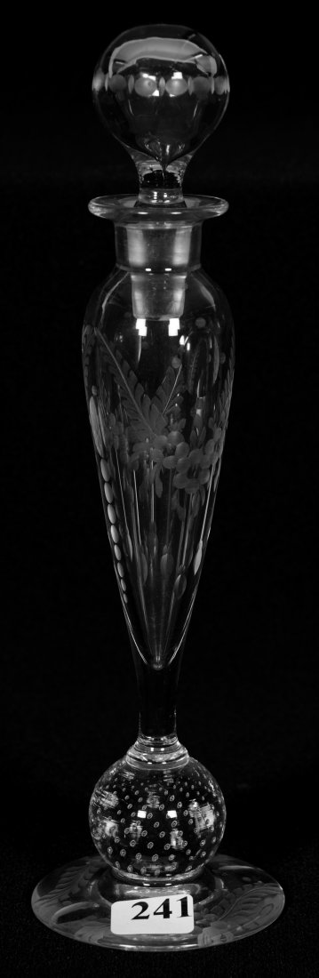 PEDESTAL PERFUME BOTTLE - 9 1/2": PEDESTAL PERFUME BOTTLE - 9 1/2" ENGRAVED FLORAL MOTIF - CONTROLLED BUBBLE STEM - PATTERN CUT BASE AND STOPPER - STOPPER HAS POSSIBLY BEEN TRIMMED - ATTRIBUTED TO PAIRPOINT