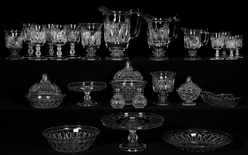(25) PIECE SET OF CANDY RIBBON PATTERN GLASS TABLE WARE: (25) PIECE SET OF CANDY RIBBON PATTERN GLASS TABLE WARE INCLUDES - COVERED DISHES, WATER PITCHER, MILK PITCHER, CAKE STAND, BOWLS AND MORE - SEE PHOTO FOR DETAILS