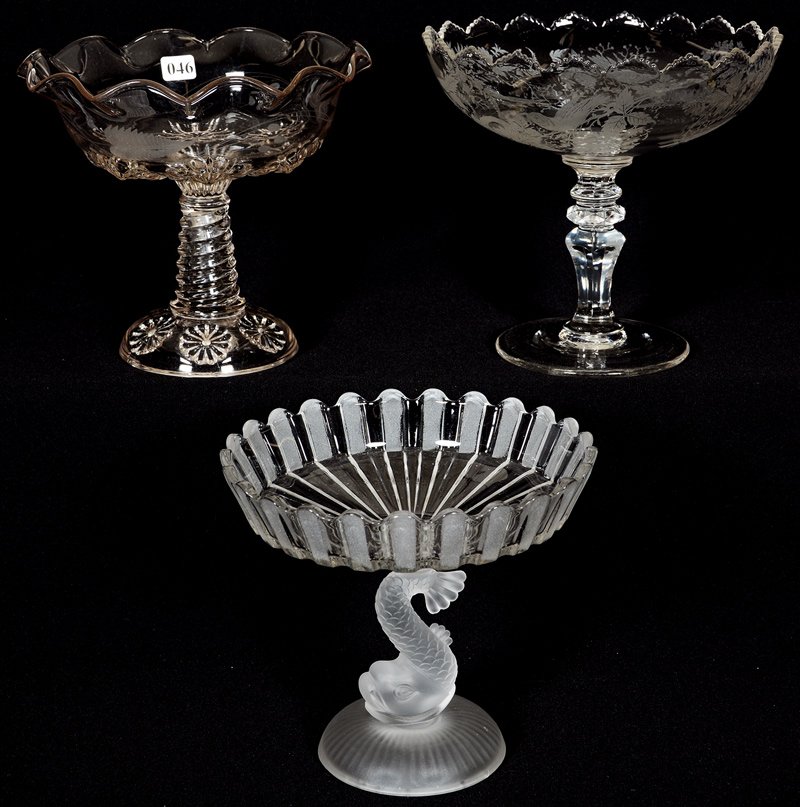 (3) PATTERN GLASS COMPOTES: (3) PATTERN GLASS COMPOTES (1) 7 1/2" X 8 1/2" FROSTED/CLEAR WITH FROSTED DOLPHIN STEM - (1) 8" X 9" WITH ETCHED BIRD AND NEST DECOR - 7 3/4" X 9" ROSETTE BAND RUFFLED COMPOTE