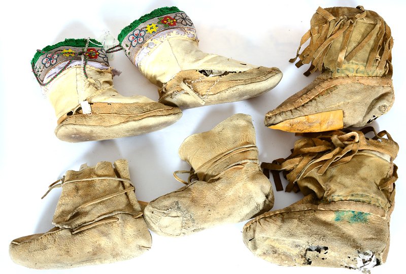 (3) PAIR ADULT NATIVE AMERICAN MOCCASINS: (3) PAIR ADULT NATIVE AMERICAN MOCCASINS (1) PAIR IS BEADED 1920'S (SEVERE INSECT DAMAGE - (1) ARAPAHO 1930'S (HOLE IN SOLE) - (1)1940'S CROW