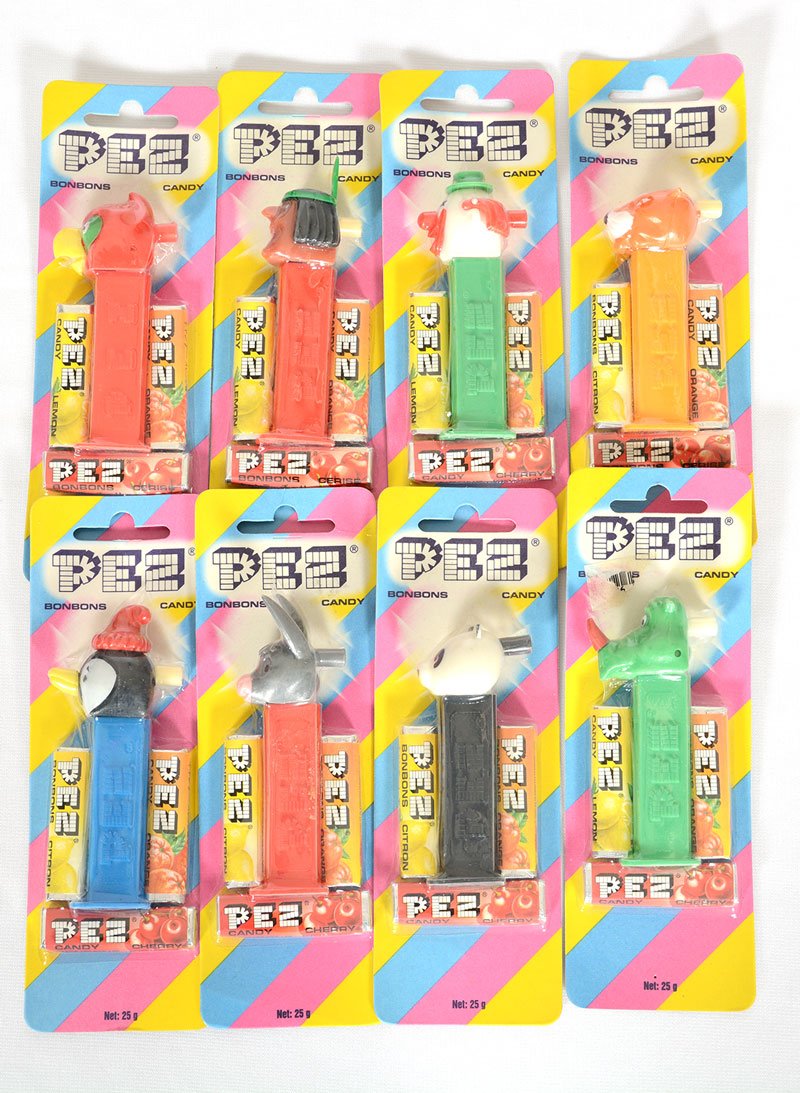 (8) ORIGINAL PEZ DISPENSERS IN ORIGINAL PACKAGING: (8) ORIGINAL PEZ DISPENSERS IN ORIGINAL PACKAGING SEE PHOTO FOR DETAILS