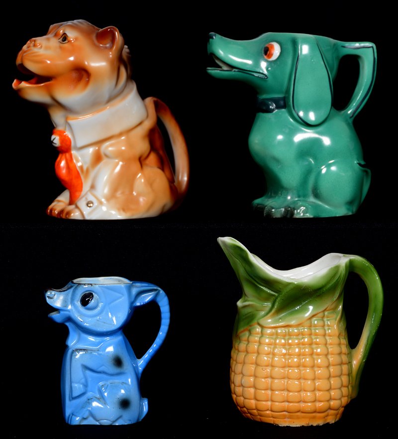(4) ASSORTED GERMAN FIGURAL CREAMERS: (4) ASSORTED GERMAN FIGURAL CREAMERS (1) 4 3/4" SPECKLED TIGER - (1) 4 1/2" GREEN DOG - (1) 4 1/4" CORN - (1) 3 1/4" BLUE DONKEY