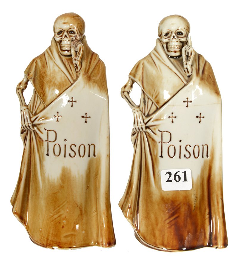 (2) 7" MARKED SCHAFER & VATER FIGURAL LIQUOR BOTTLES: (2) 7" MARKED SCHAFER & VATER FIGURAL LIQUOR BOTTLES TITLED "POISON" - SKELETON IN ROBE - (1) BOTTLE HAS FINGER WITH PROFESSIONAL REPAIR