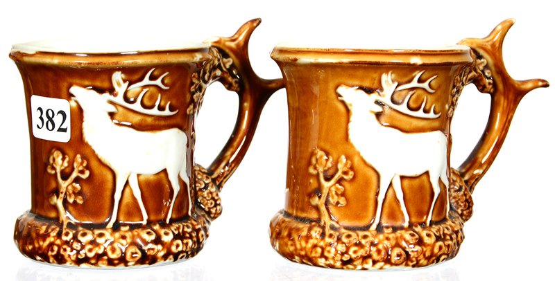 (2) 3 1/2" SCHAFER & VATER MUGS WITH EMBOSSED ELK HORN: (2) 3 1/2" SCHAFER & VATER MUGS WITH EMBOSSED ELK HORN HANDLES BROWN AND WHITE