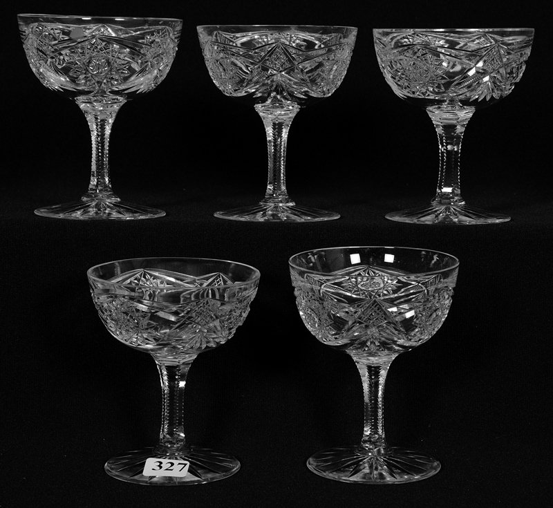 (5) CHAMPAGNE GLASSES - APPROX. 4": (5) CHAMPAGNE GLASSES - APPROX. 4" HOBSTAR, CROSSCUT DIAMOND AND FAN MOTIF - (2) HAVE RIM NICKS - SLIGHT HEIGHT VARIATIONS AMONG THE CHAMPAGNES