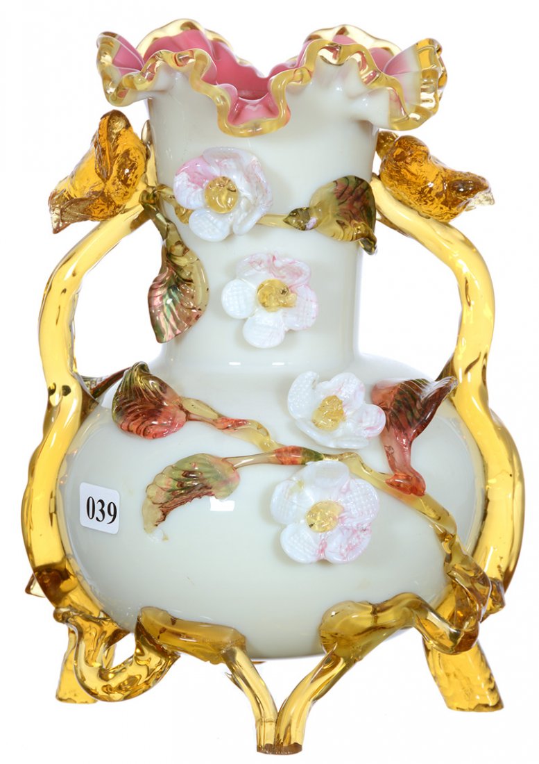 9 1/2" STEVENS & WILLIAMS CASED ART GLASS VASE: 9 1/2" STEVENS & WILLIAMS CASED ART GLASS VASE PINK INTERIOR - WHITE EXTERIOR - APPLIED AMBER HANDLES AND FEET - BLOSSOM HIGHLIGHTS - FIGURAL BIRDS ON HANDLES - (1) LEG MISSING IN BACK REPLACED WITH A
