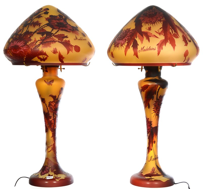 (2) 25" MODERN REPRODUCTION MARKED MADELAINE CAMEO: (2) 25" MODERN REPRODUCTION MARKED MADELAINE CAMEO TABLE LAMPS YELLOW BACKGROUND ON BOTH WITH DARK PINK OVERLAY - (1) POPPY DECOR AND BUTTERFLY HIGHLIGHTS - (1) FLORAL BLOSSOM AND BUTTERFLY HIGHLIGHTS
