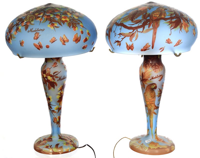 (2) 24 1/2" MODERN REPRODUCTION MARKED MADELAINE CAMEO: (2) 24 1/2" MODERN REPRODUCTION MARKED MADELAINE CAMEO TABLE LAMPS ICE BLUE BACKGROUND WITH GREEN AND ORANGE OVERLAY HIGHLIGHTS - (1) WITH PARROT AND BUTTERFLY MOTIF - (1) BIRD, BERRY AND BUTTERFLY MO
