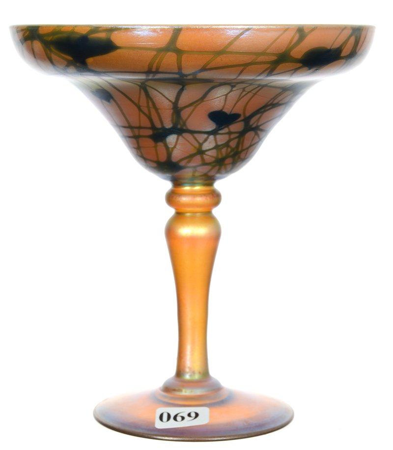 6 1/2" X 6" UNMARKED ART GLASS COMPOTE: 6 1/2" X 6" UNMARKED ART GLASS COMPOTE STRONG GOLD IRIDESCENCE WITH GREEN HEART AND VINE EXTERIOR DECOR - VERY NICE - ATTRIBUTED TO STEUBEN