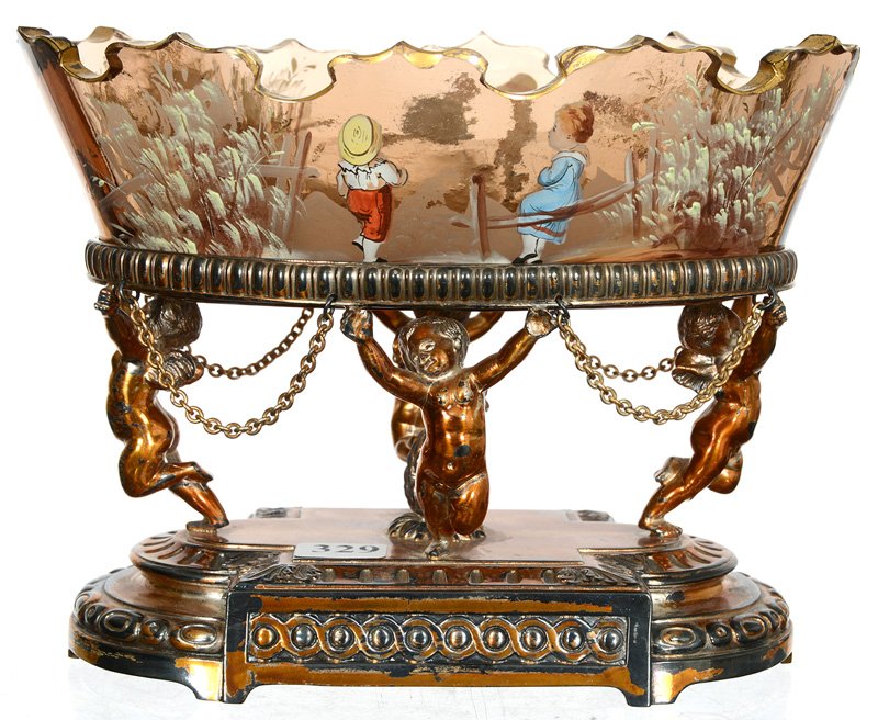 UNIQUE 6" X 8" OVAL BOWL ON STAN AND GID: UNIQUE 6" X 8" OVAL BOWL ON STAN AND GID AMBER ART GLASS BOWL WITH CASTLE EDGE FEATURING ENAMEL BOY AND GIRL SCENIC DECOR - SET ON ORNATE WILCOX SILVERPLATE STAND WITH BRONZE HIGHLIGHTS