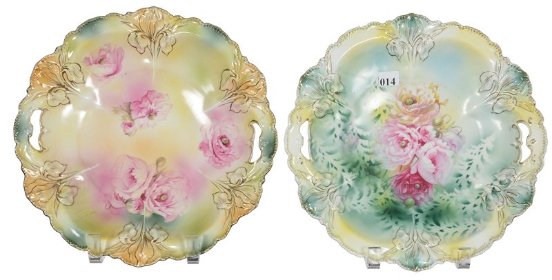 (2) 10 3/4" RSP IRIS MOLD TWO-HANDLED CAKE PLATES: (2) 10 3/4" RSP IRIS MOLD TWO-HANDLED CAKE PLATES (1) GREEN, YELLOW AND WHITE TONES WITH POPPY DECOR - (1) YELLOW AND GREEN TONES WITH PINK POPPY DECOR
