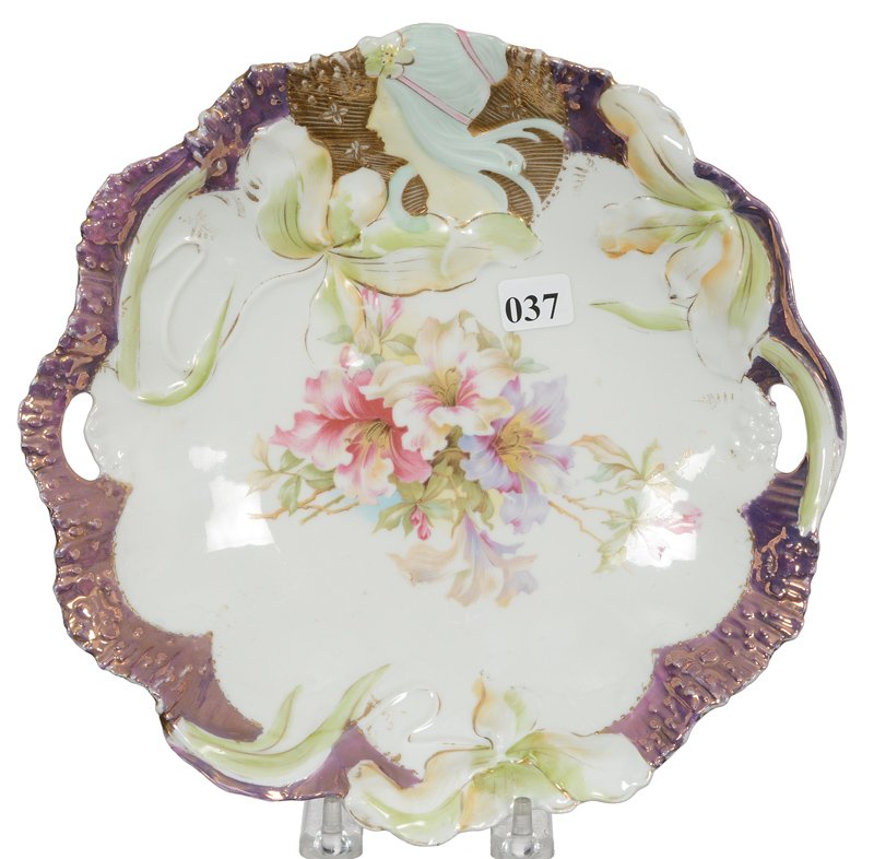 9 1/2" UNMARKED PRUSSIA TWO-HANDLED CAKE PLATE: 9 1/2" UNMARKED PRUSSIA TWO-HANDLED CAKE PLATE WHITE CENTER WITH IRIDESCENT LAVENDER BORDER - HIDDEN IMAGE MOLD - GOLD BACKGROUND BEHIND IMAGE