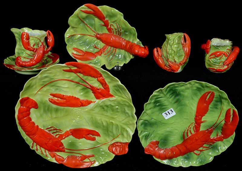 (6) ASSORTED GERMAN LOBSTER AND LETTUCE FIGURAL ITEMS: (6) ASSORTED GERMAN LOBSTER AND LETTUCE FIGURAL ITEMS (1) 8 1/2" PLATE - (1) 7" PLATE - (1) 6" TRAY - (1) 2 3/4" SHAKER - (1) TOOTHPICK HOLDER - (1) CUP & SAUCER - A NUMBER OF THESE ARE MARKED "COPYRI