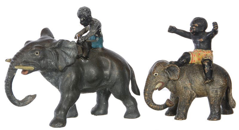 (2) FIGURAL PAINTED METAL ELEPHANTS WITH  BLACK RIDERS (1 of 3)